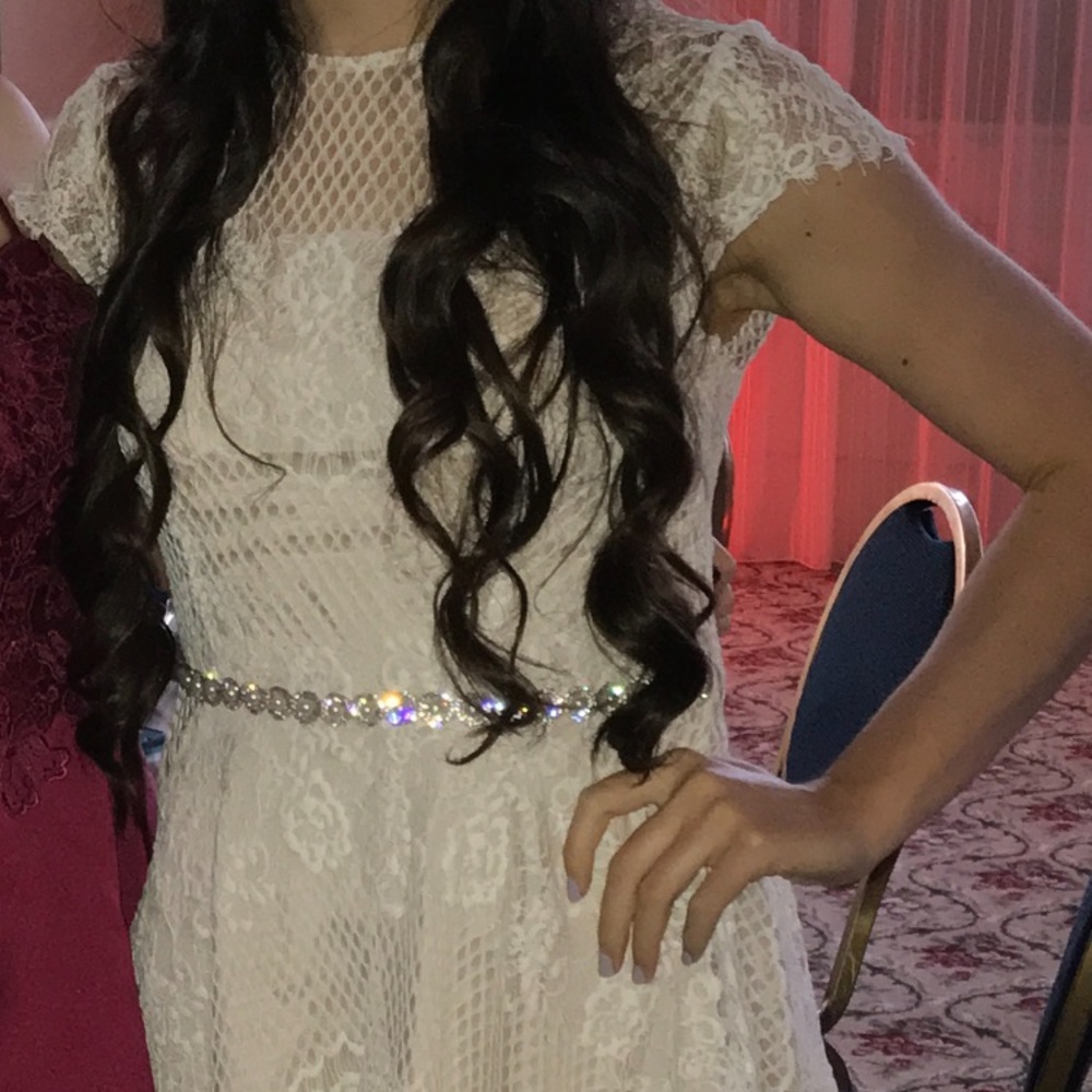 Short white lace dress with embellished belt